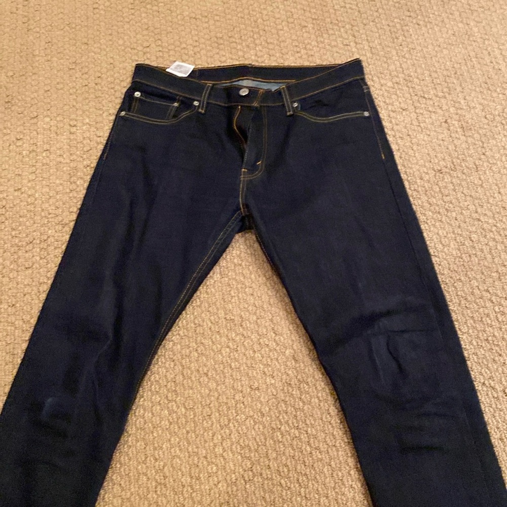 Men’s Levi 512 dark denim.